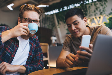 Multiracial business men working in office space