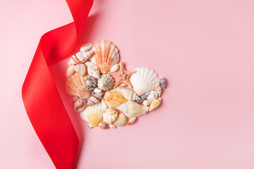 Flatlay with heart made of seashells