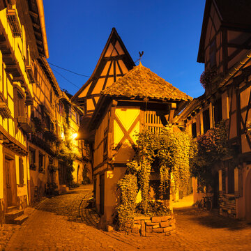 Half-timbered houses in the old town of Eguisheim, Alsace, Alsatian Wine Route, Haut-Rhin, France