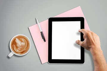 tablet computer with a cup of tea or coffee. concept business or to do list goals