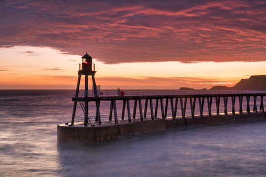 Sunrise over Whitby harbour and the River Esk, The North Yorkshire Coast, Yorkshire, England