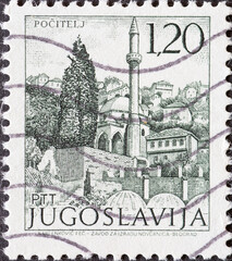 Yugoslavia - circa 1972 : a postage stamp from Yugoslavia, showing the Mosque in Pocitelj.