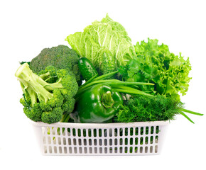 Set of various vegetables. Broccoli, tomatoes, peppers in the basket. White background.