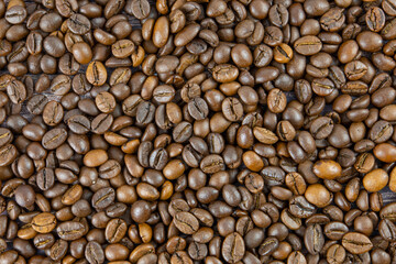 Coffee beans on the table. Texture of coffee beans.