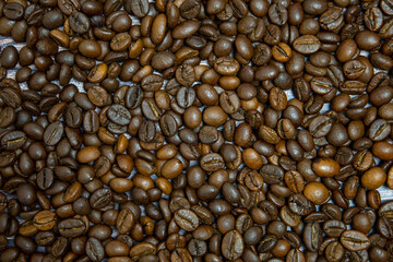 Coffee beans on the table. Texture of coffee beans.