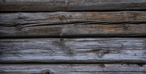 Weathered old wooden vintage barn wood. Timber wood wall texture background. Used as natural background. Vintage toned. Empty template.