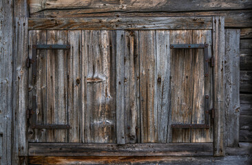 Weathered old wooden vintage barn wood. Timber wood wall texture background. Used as natural background. Vintage toned. Empty template.