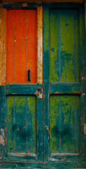 View of a old beautiful house exterior and front door seen on an italian village street.