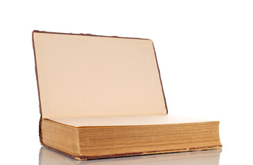 One old book, macro shot, isolated on a white background.