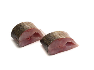 Pieces of red-finned mullet isolated on a white background