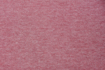 pink knitted material texture for warm textile background
