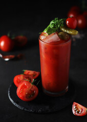 A glass with cold bloody mary cocktail