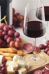 Red wine in a transparent white glass	