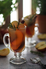 Warm apple autumn drink with cinnamon