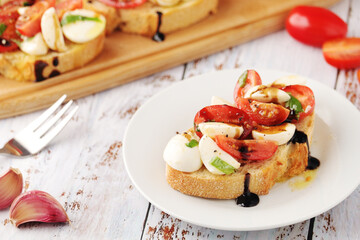Italian bruschetta with tomatoes and mozzarella
