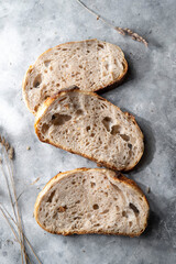 Sourdough bread slices, homemade healthy bread, top view.