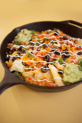 Delicious Load Nachos in Cast Iron Pan