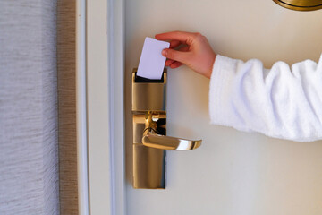 Using key card for access digital door systems and unlocking door in hotel room