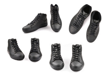 men's black leather shoes and a black camera on a black background. Copy space. - Powered by Adobe