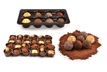 Chocolate candy collection in plastic box.