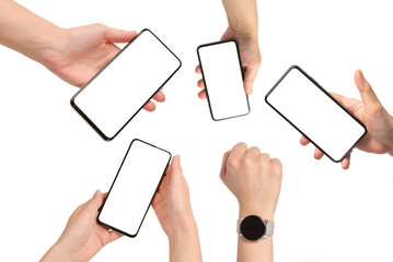 Obraz premium Smart phone in woman hands isolated on white background. White screen. Copy space.
