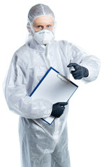 A man in a protective suit, mask, gloves and glasses holds a paper tablet with a white sheet for inscription and looks at the camera and points to us. chemical hazard, infection. precautions. isolated