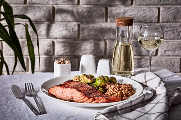 vintage style of table set with grilled salmon