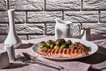 vintage style of table set with grilled salmon