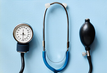 A sphygmomanometer for used to measure the blood pressure, blue background, close up