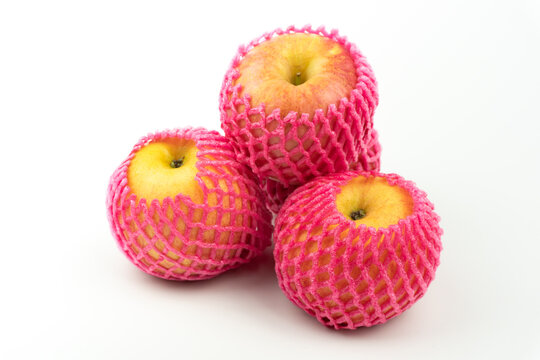 Apple is protective by foam net packaging Isolated on white background, Netting Package