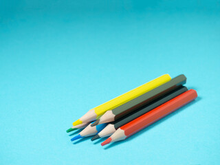 School supplies.   Multicolored pencils.  The process of preparing for work.