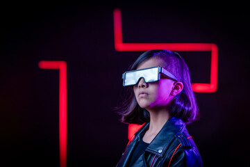 cyberpunk gamer in futuristic glasses near red neon lighting, virtual reality and metaverse concept
