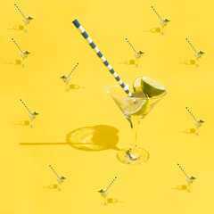 Martini glasses pattern with vermouth, straw,sugar and lime on yellow background.