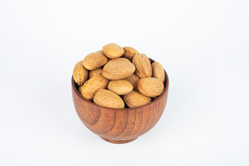 Almond nuts isolated on a white background, close up. Delicious almonds.