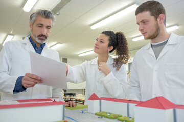 Fototapeta premium artistic positive students working on new exciting project