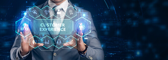 Business, Technology, Internet and network concept. Technology future. Young businessman clicks on the virtual display button: Customer Experience.