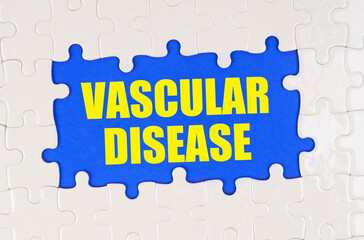 Inside the white puzzles on a blue background it is written - vascular disease