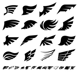 Wings silhouettes of bird feathers, heraldic icons