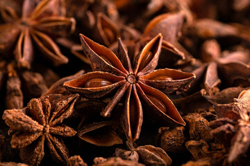 Anise stars herbs on rustic old table.