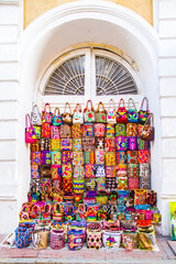 Colorful handmade bags in a window. Cartagena, Bolivar, Colombia.