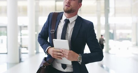 Young caucasian businessman arriving rushing looking around holding a digital tablet at work.