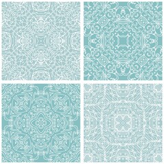Set of ceramic tiles with lacy white ornament on light blue background. Winter motifs. Patchwork design.