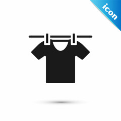 Grey Drying clothes icon isolated on white background. Clean shirt. Wash clothes on a rope with clothespins. Clothing care and tidiness. Vector