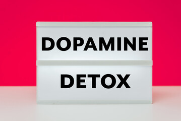 Dopamine detox text on white box with pink background