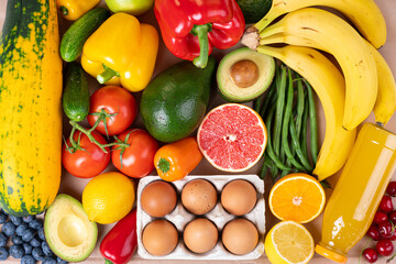 Background of healthy food. Healthy food vegetables, fruits on white. Shopping vegetarian food supermarket, clean eating, food delivery concept