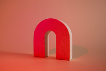 Concrete circle shaped pedestal on green light neon background. Podium mockup background for products. Advertising template. Stone platform. Abstract geometric