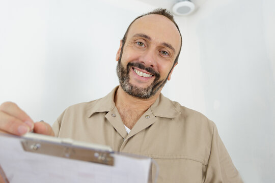 Happy Builder Using A Clipboard