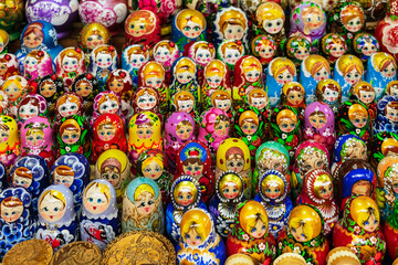 Russian folk dolls. Colorful nesting dolls matryoshka at market, popular souvenirs from Russia