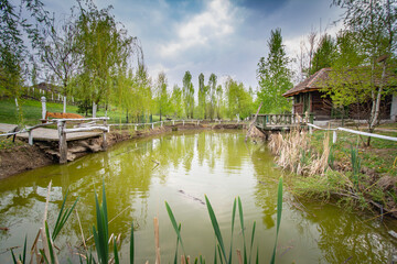 Beautiful view of a lake with houses around, village and nature