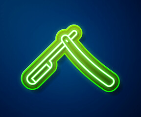 Obraz premium Glowing neon line Straight razor icon isolated on blue background. Barbershop symbol. Vector Illustration